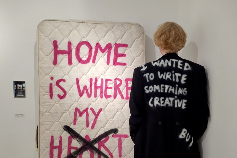 the artist Dear Anushka with her artwork